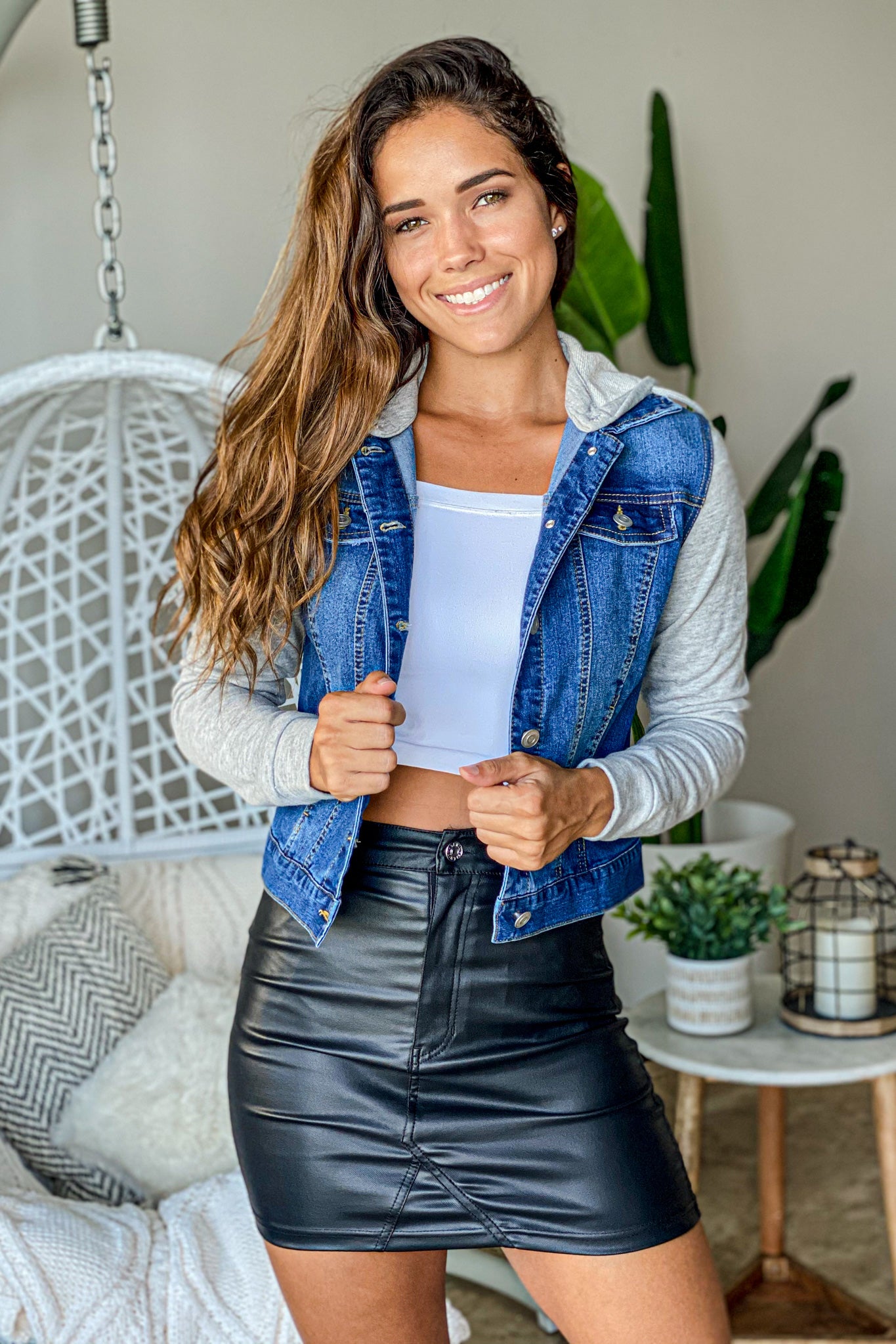 blue jean jacket with gray hood