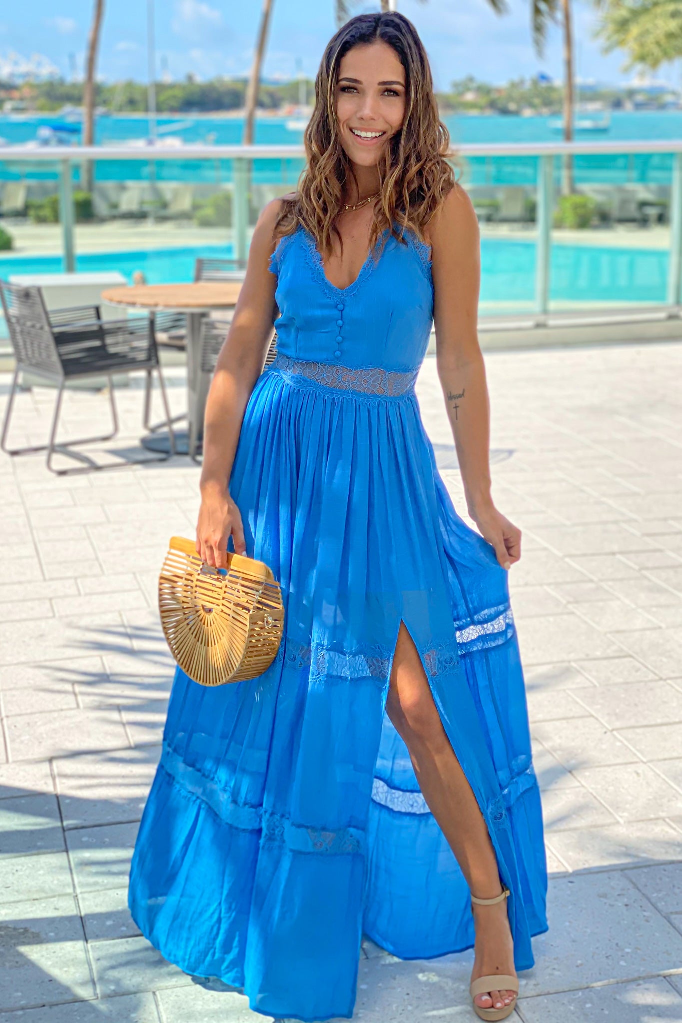 blue maxi dress with lace trim and slit