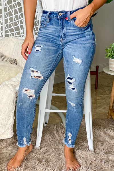 dark denim jeans with leopard details