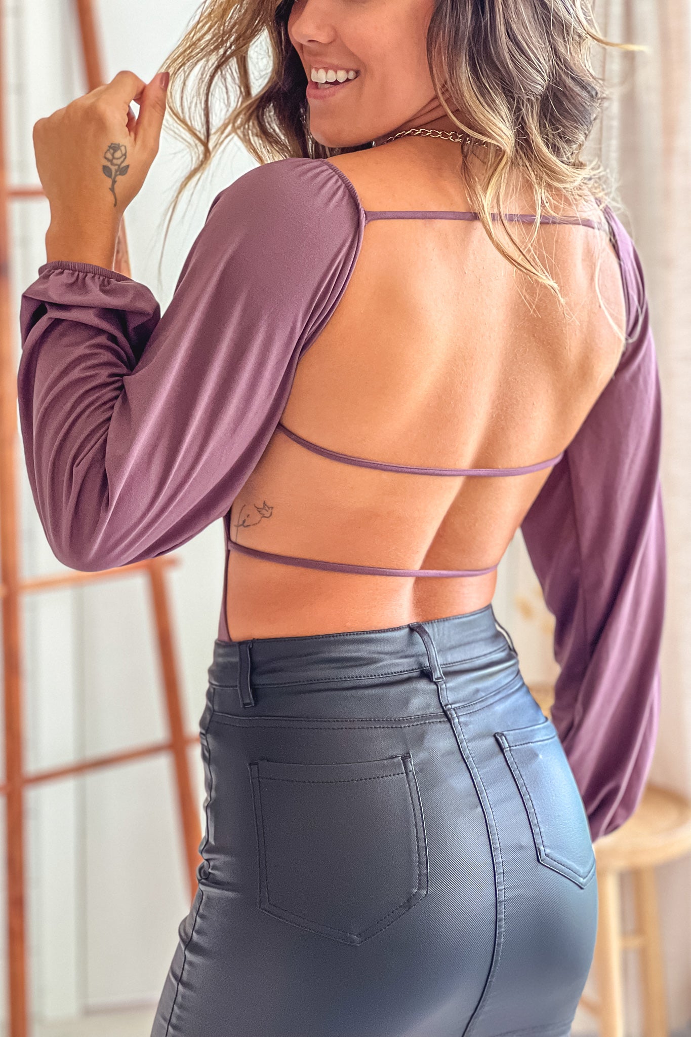 dusty purple long sleeve bodysuit with open back