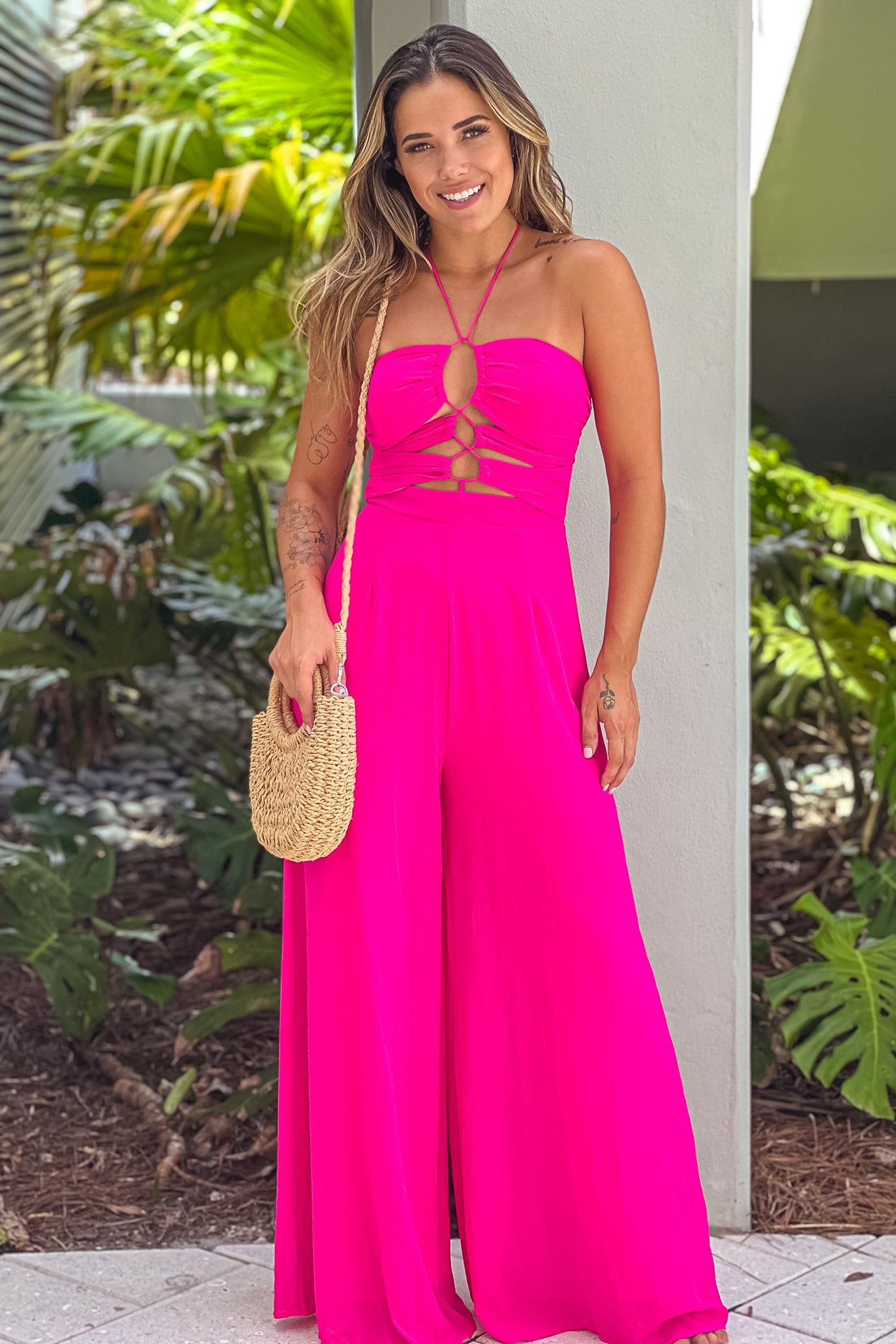 fuchsia jumpsuit with cut outs