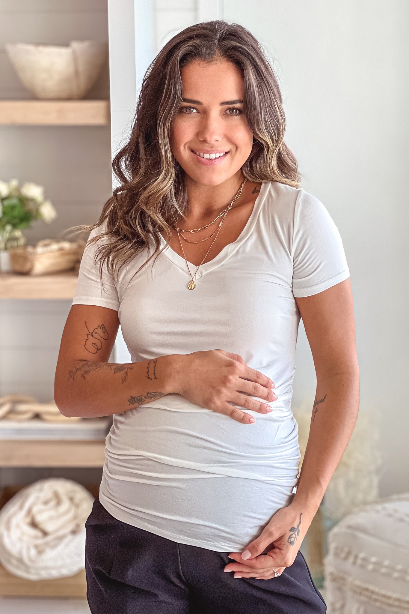 ivory v-neck maternity top with ruched side