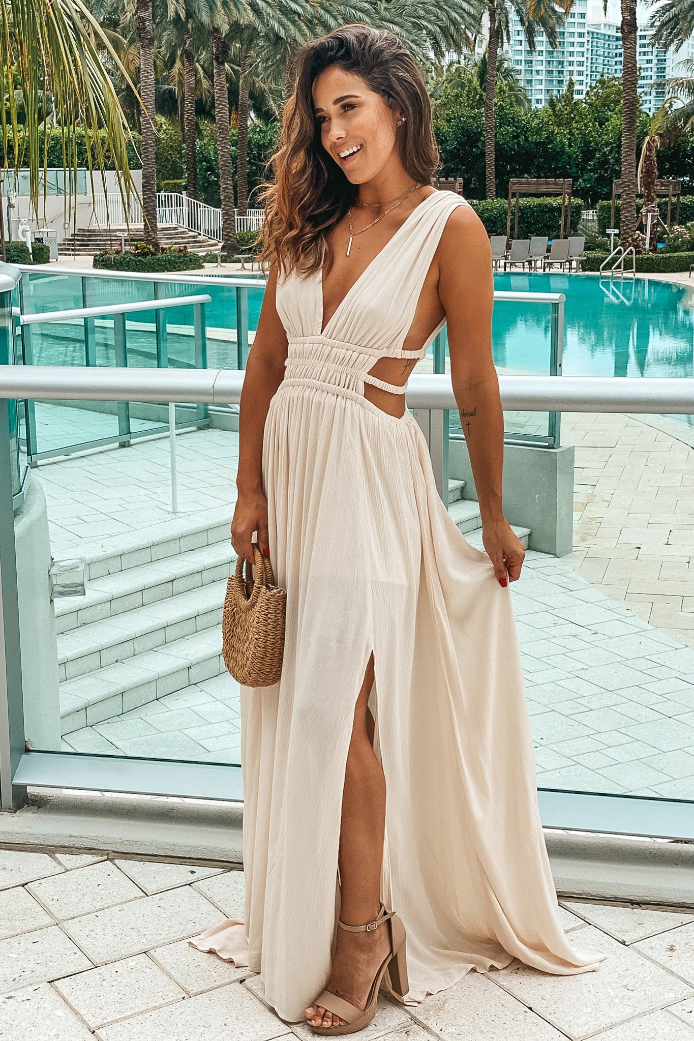 ivory v-neck maxi dress with cut out and side slit