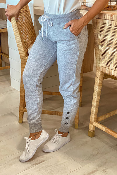 light heather gray sweatpants with button detail