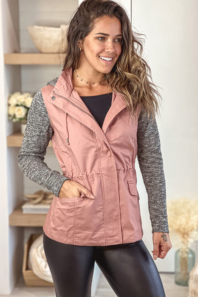 mauve jacket with gray sleeves