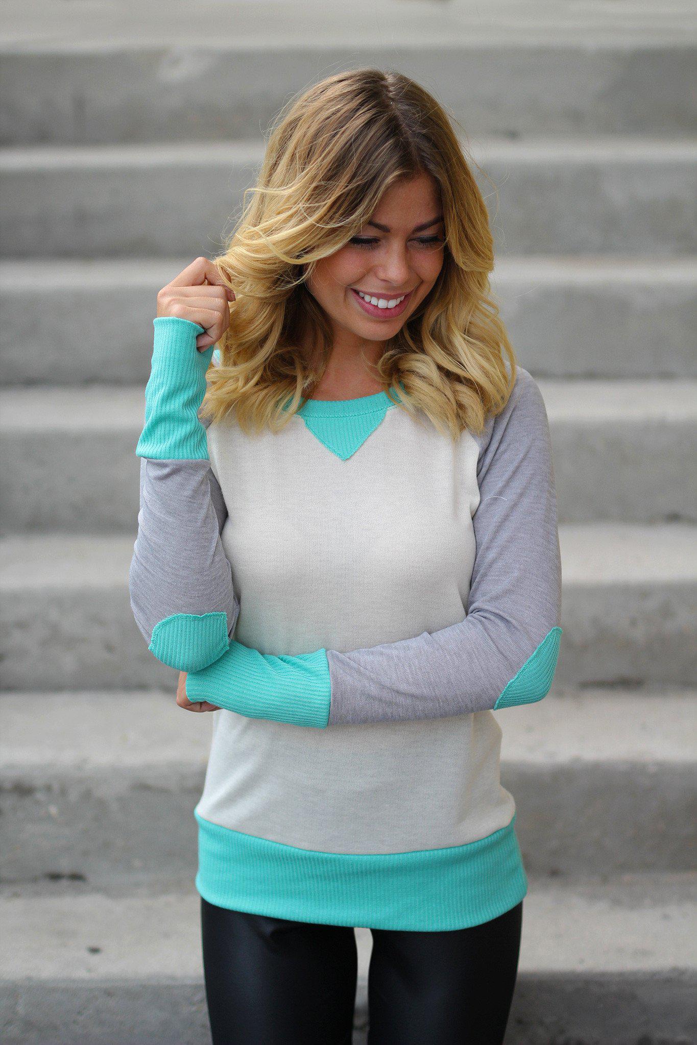 mint cream top with elbow patches