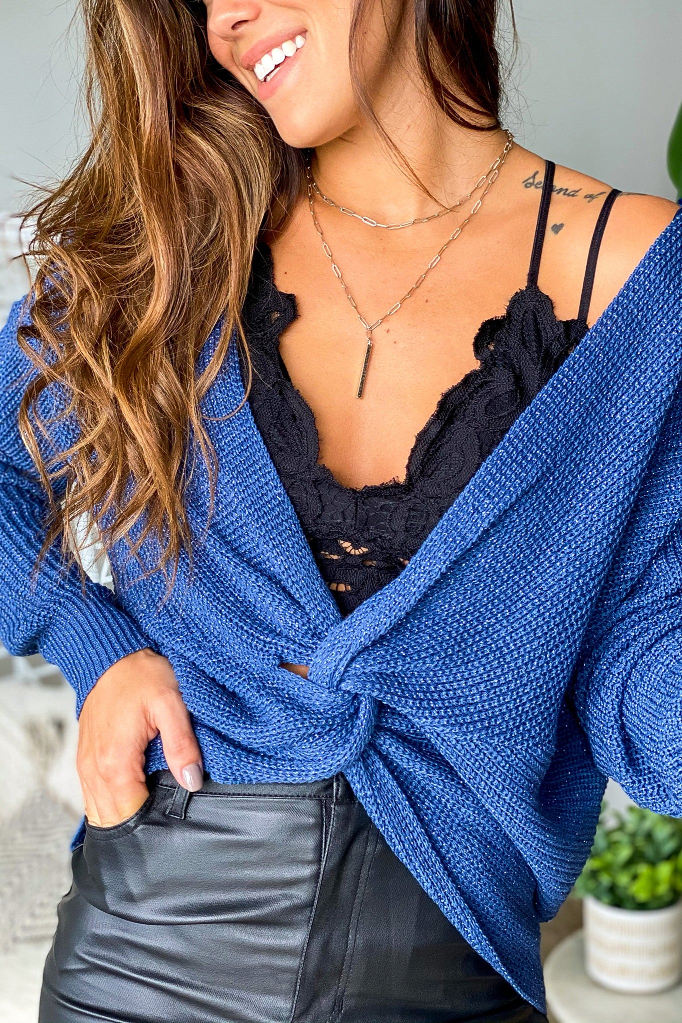 ocean blue sweater with twist detail