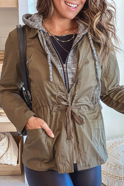 olive jacket with gray hood