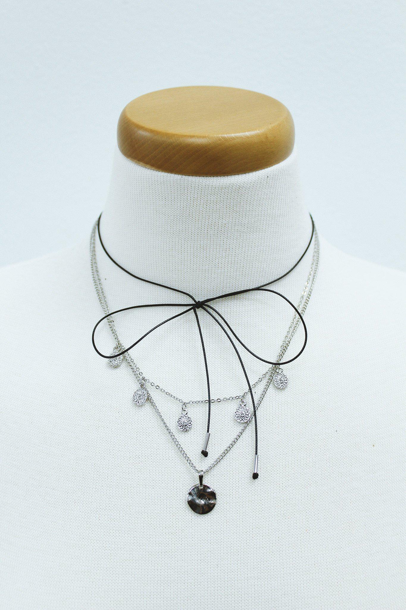 silver and black tie layered necklace