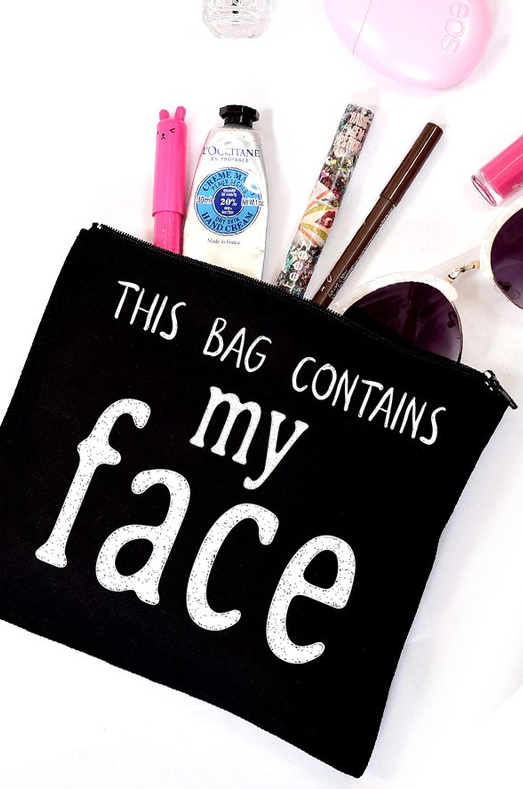 Black "This bag contains my face" Makeup Bag
