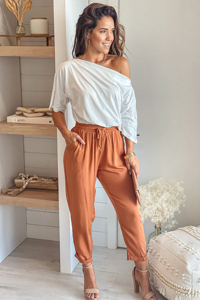 white and camel jumpsuit with pockets