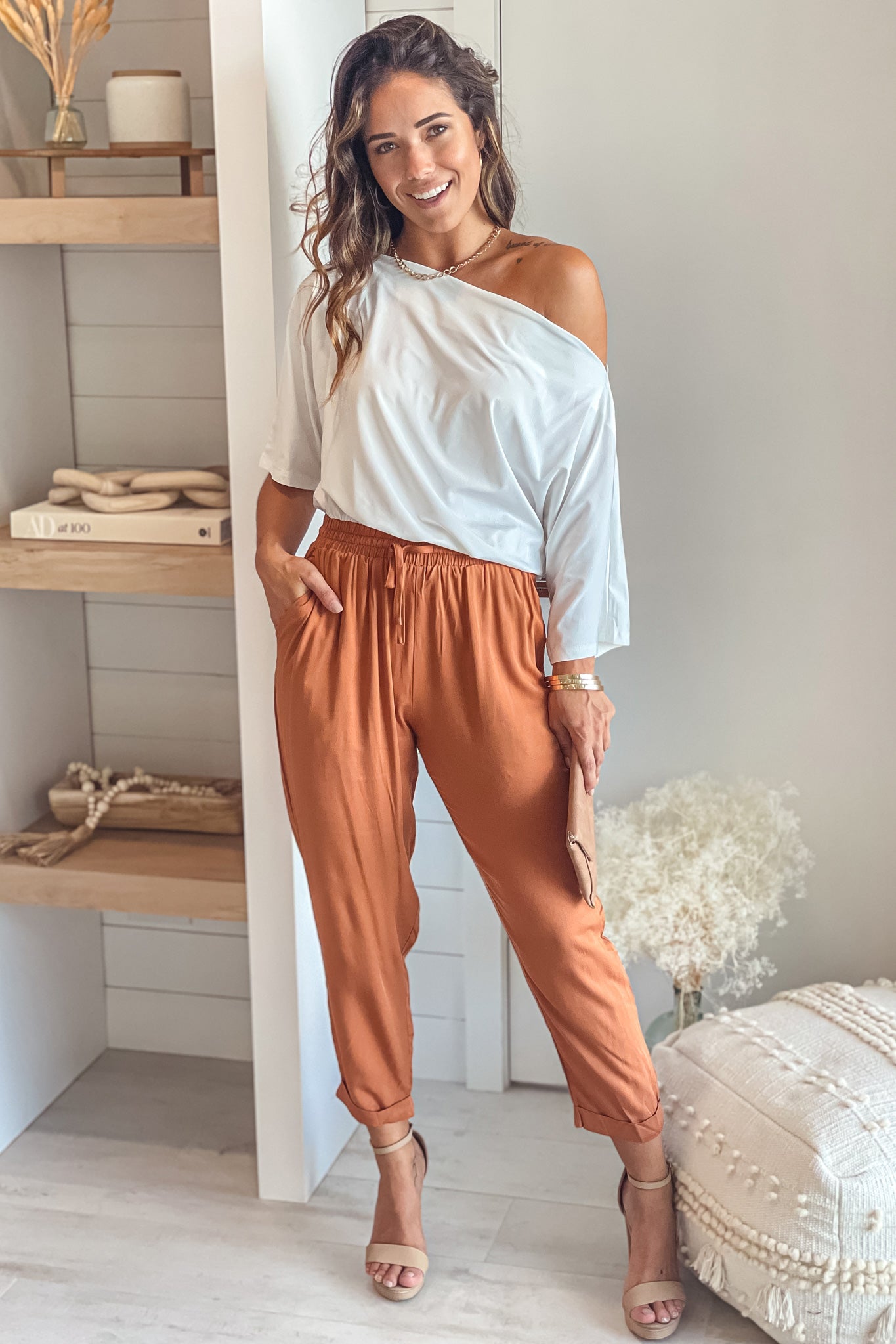 white and camel one shoulder jumpsuit
