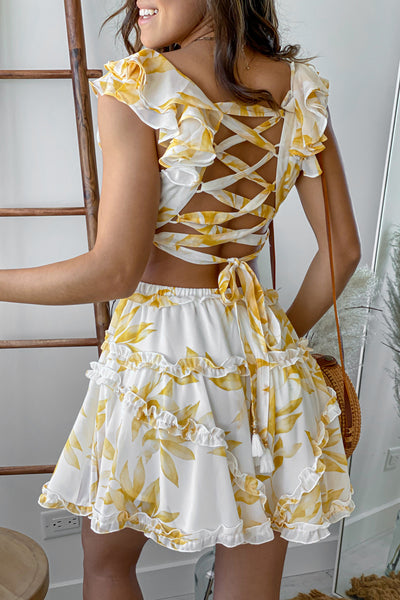 white and yellow floral short dress with strappy back