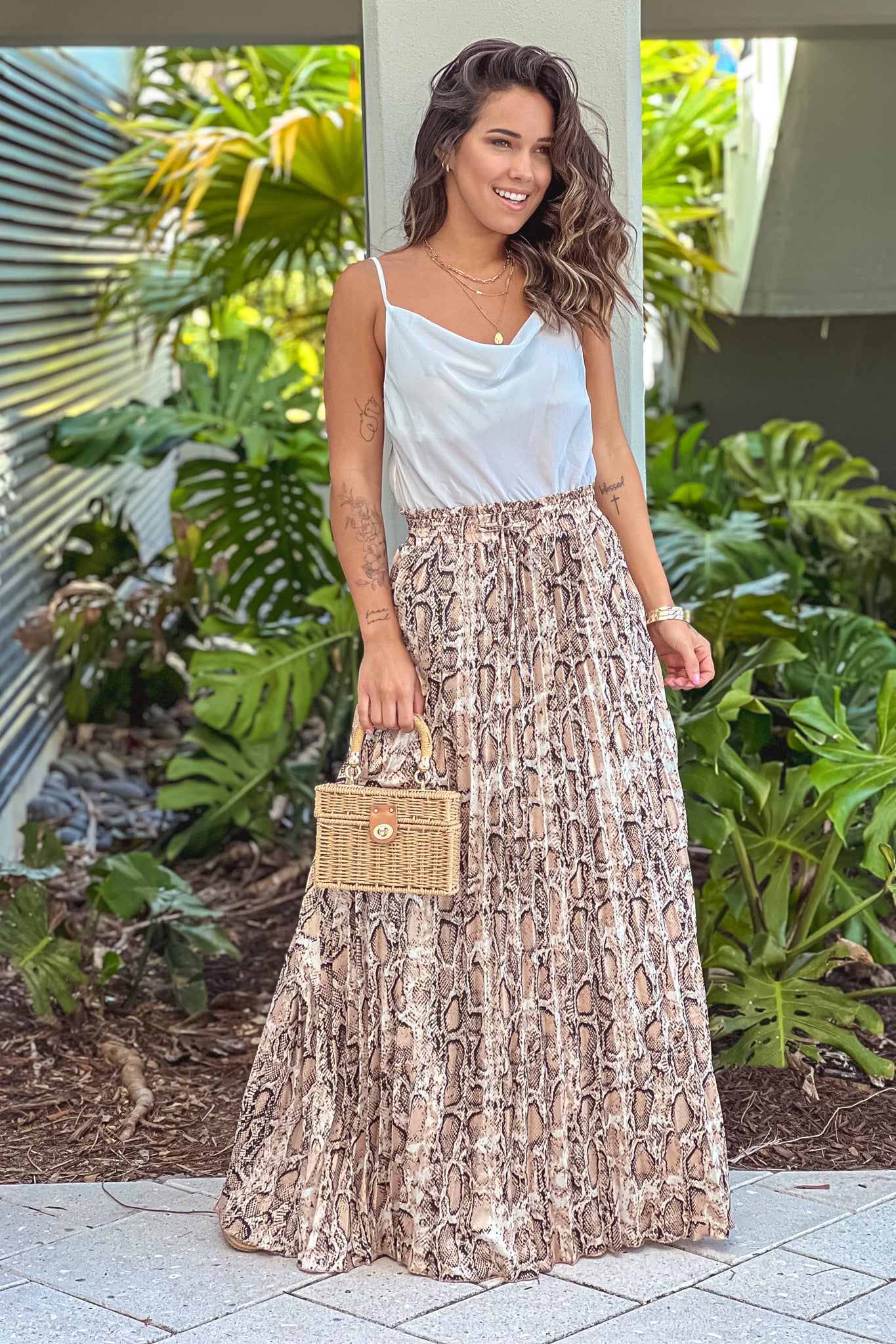 white draped top maxi dress with pleated leopard skirt