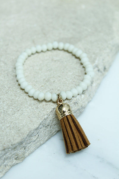 white and brown bracelet